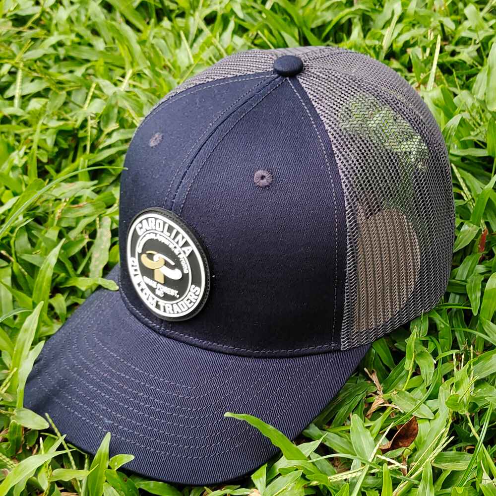 Topone Custom PVC patch on front panels Navy cotton on front and visor charcoal mesh back 112 trucker hats Left View