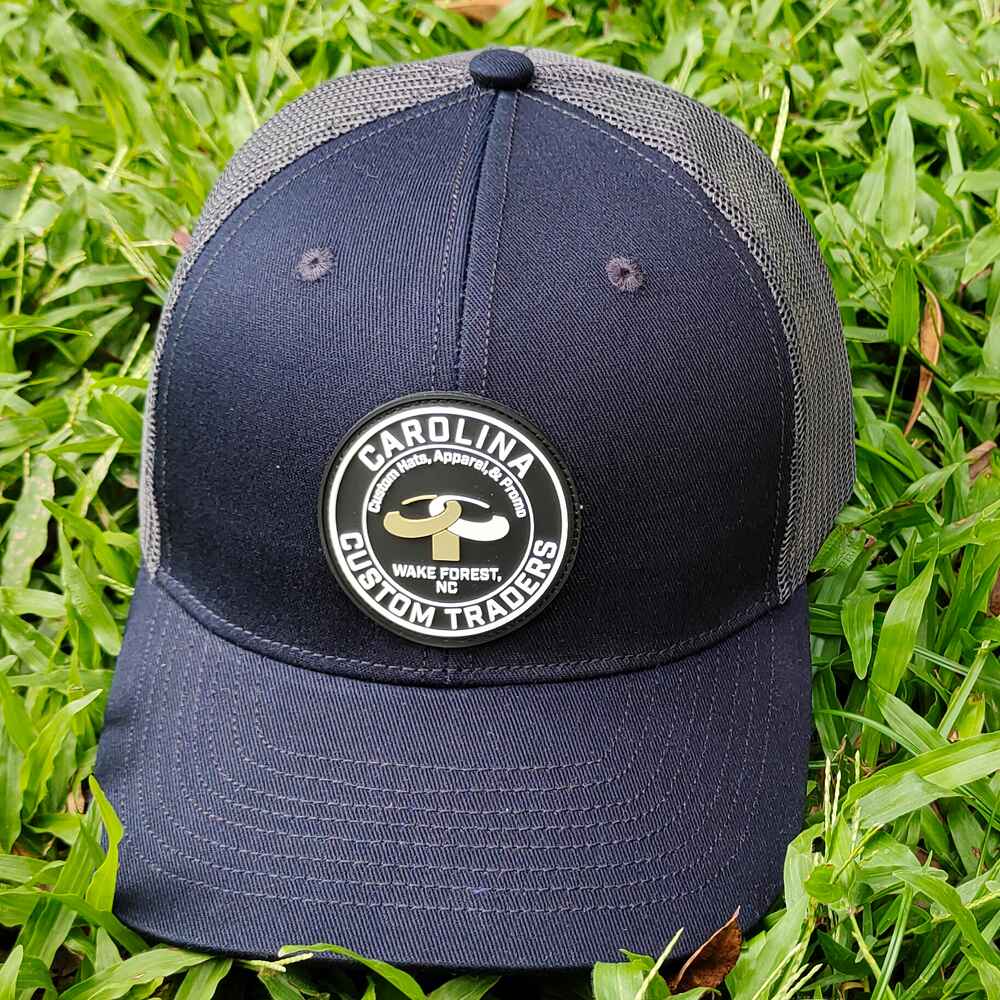 Topone Custom PVC patch on front panels Navy cotton on front and visor charcoal mesh back 112 trucker hats front view