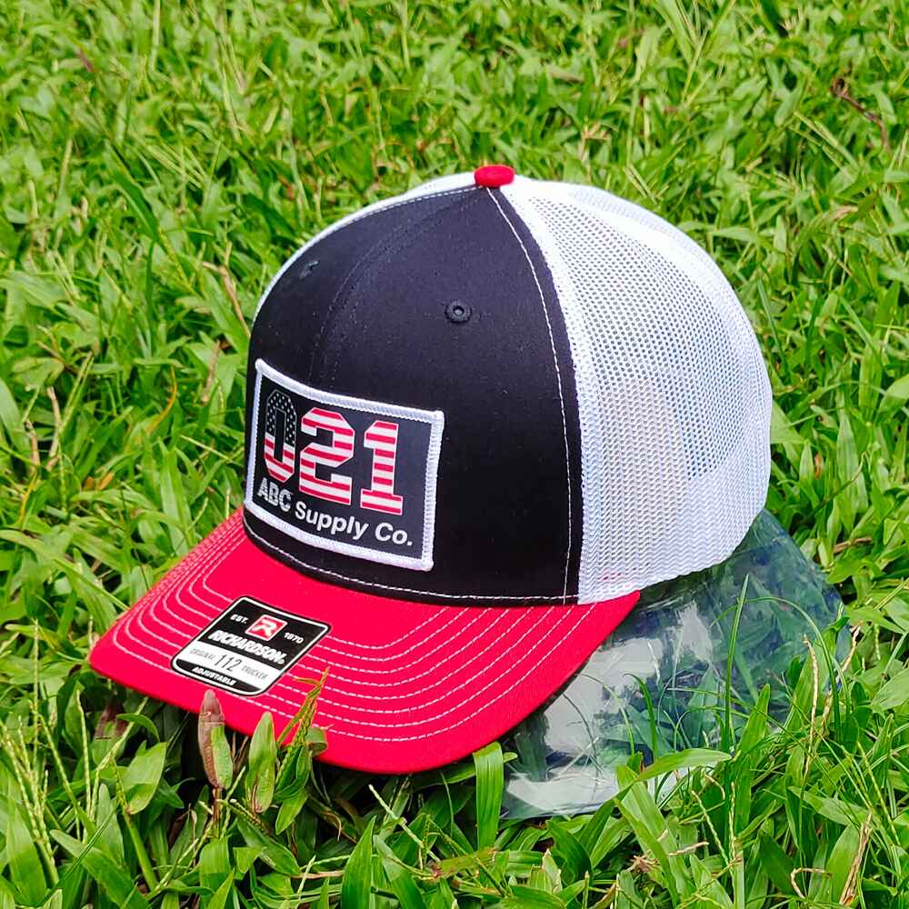 Topone Custom Printed Patch on front Navy cotton on front panels White Mesh back Red Cotton Visor Trucker hats Left View